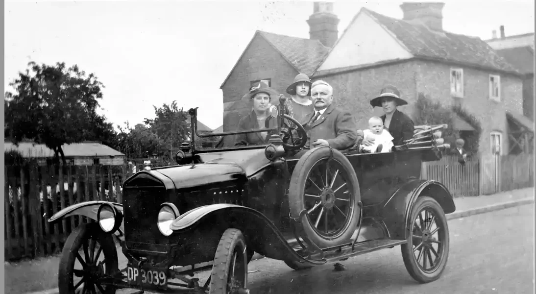 A family sat in a motor car c1924