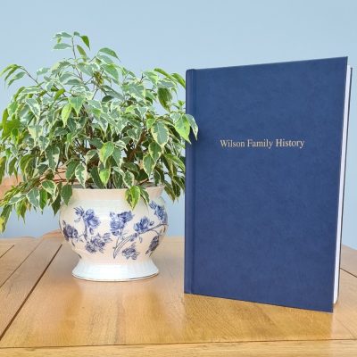 Book with family History in gold lettering on the front